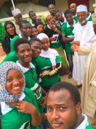 Young women and men from MR CITY Lab take a selfie during their community outreach for restoring indigenous tree species in Kano city, Nigeria. Young women and men from MR CITY Lab take a selfie during their community outreach for restoring indigenous tree species in Kano city, Nigeria.
