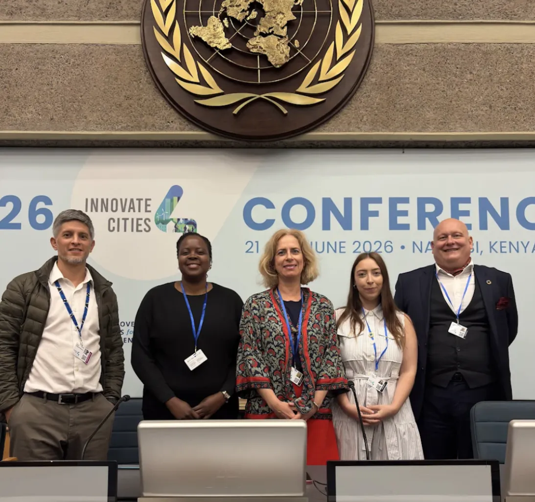 Panelists pose for a photo with Maria Dombrov.