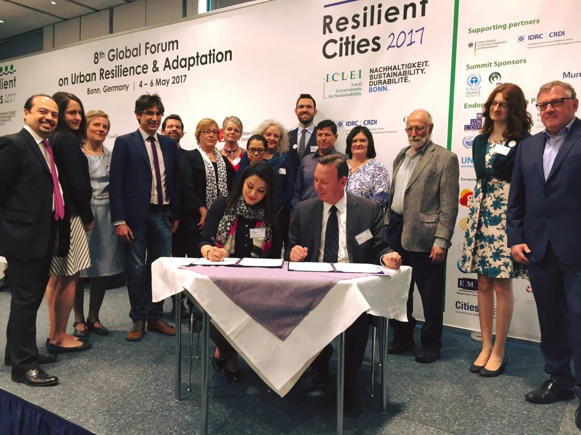 Signing the MoU between UCCRN and ICLEI